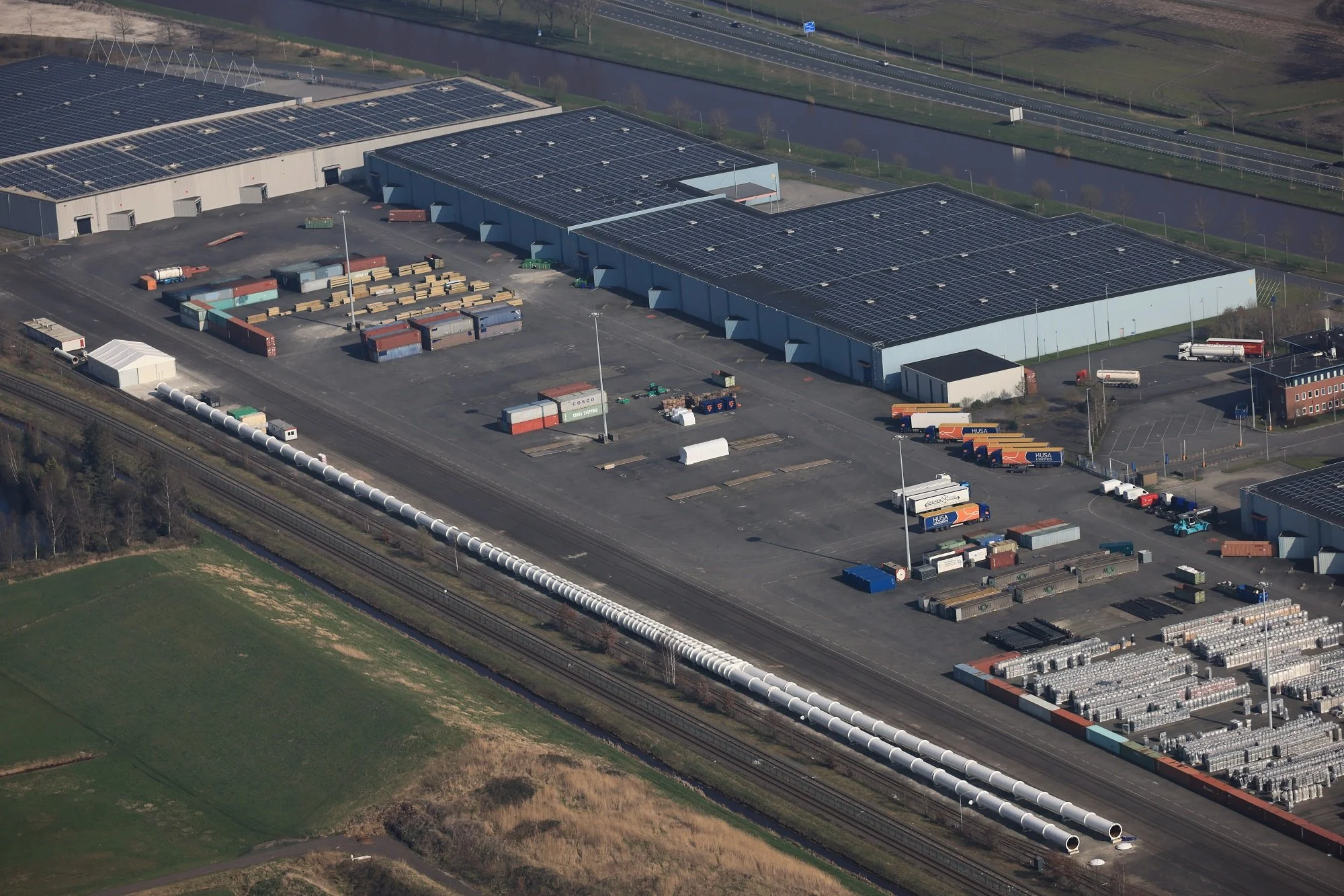 Aerial view of the 420 m European Hyperloop Center test tube with lane switch in Veendam